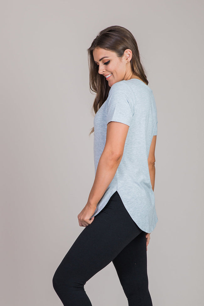 gray shirt with curved hem